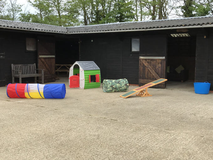 Photo of the yards and stables at Green Meadow Dog Day Care
